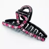 JEANS Hiustarvikkeet>Hainhammasklipsi strasseilla 11 cm musta/fuksia